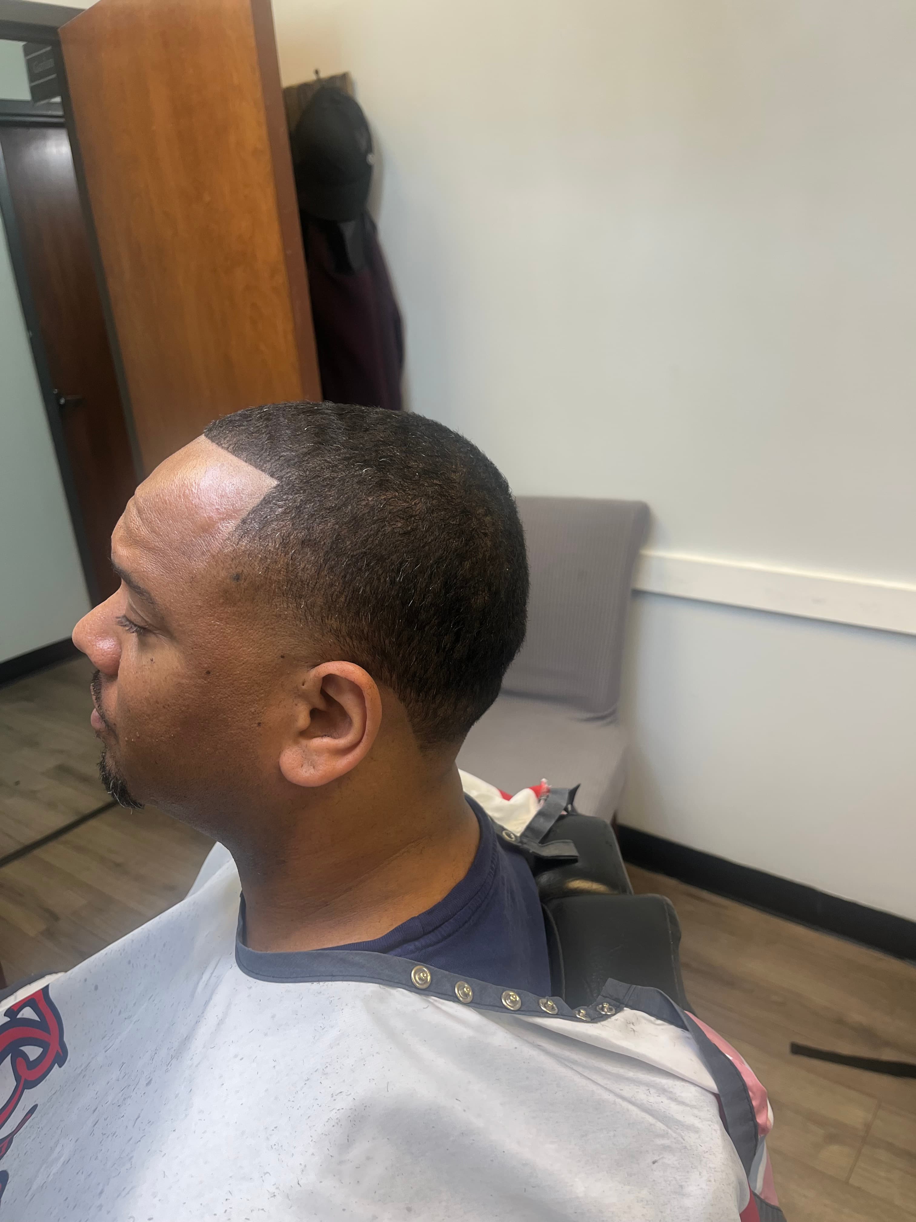 Classic men's haircut by master barber Garland in Suwanee GA