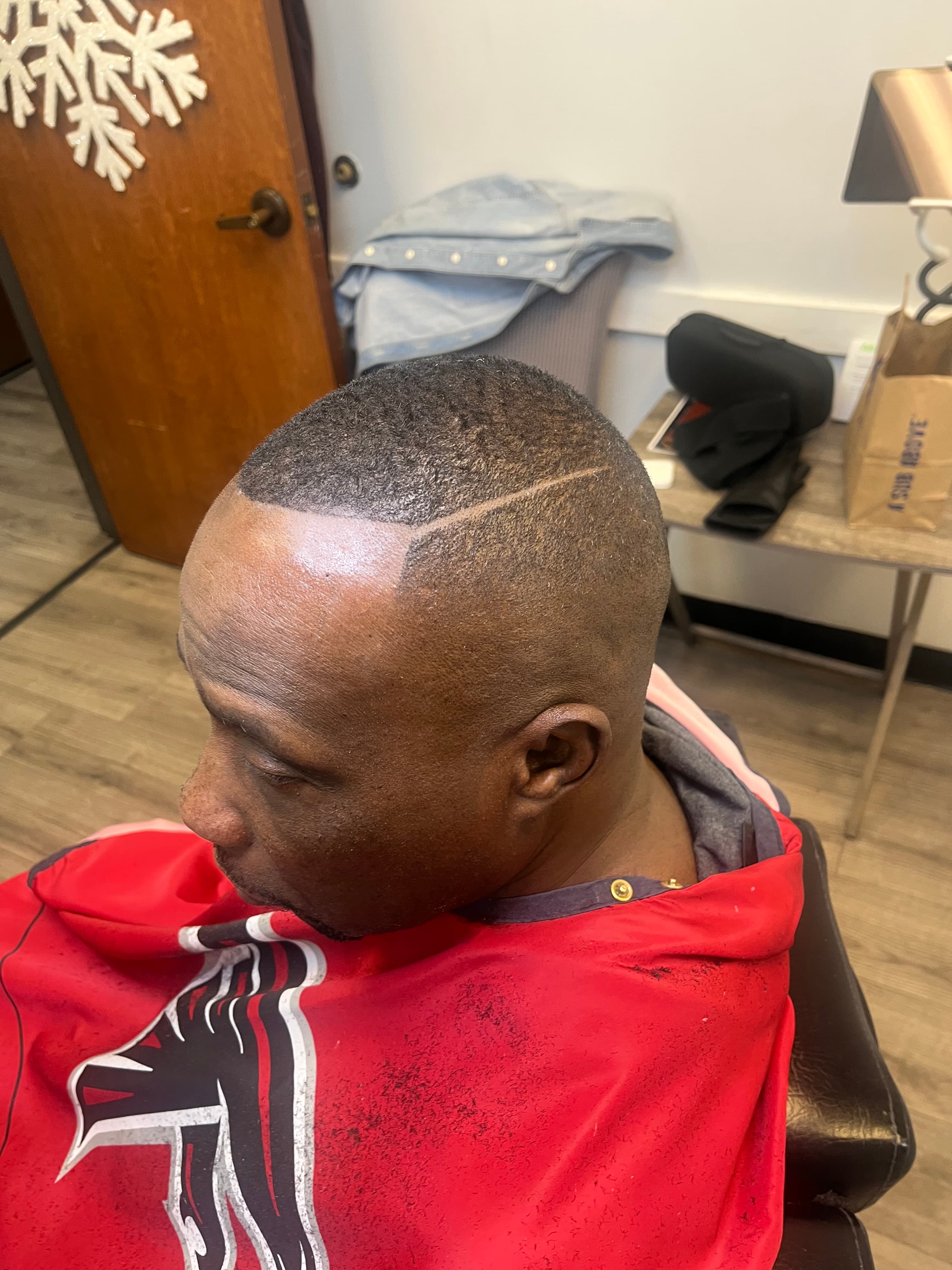 Creative hair design with precision fade at Garland Cuts