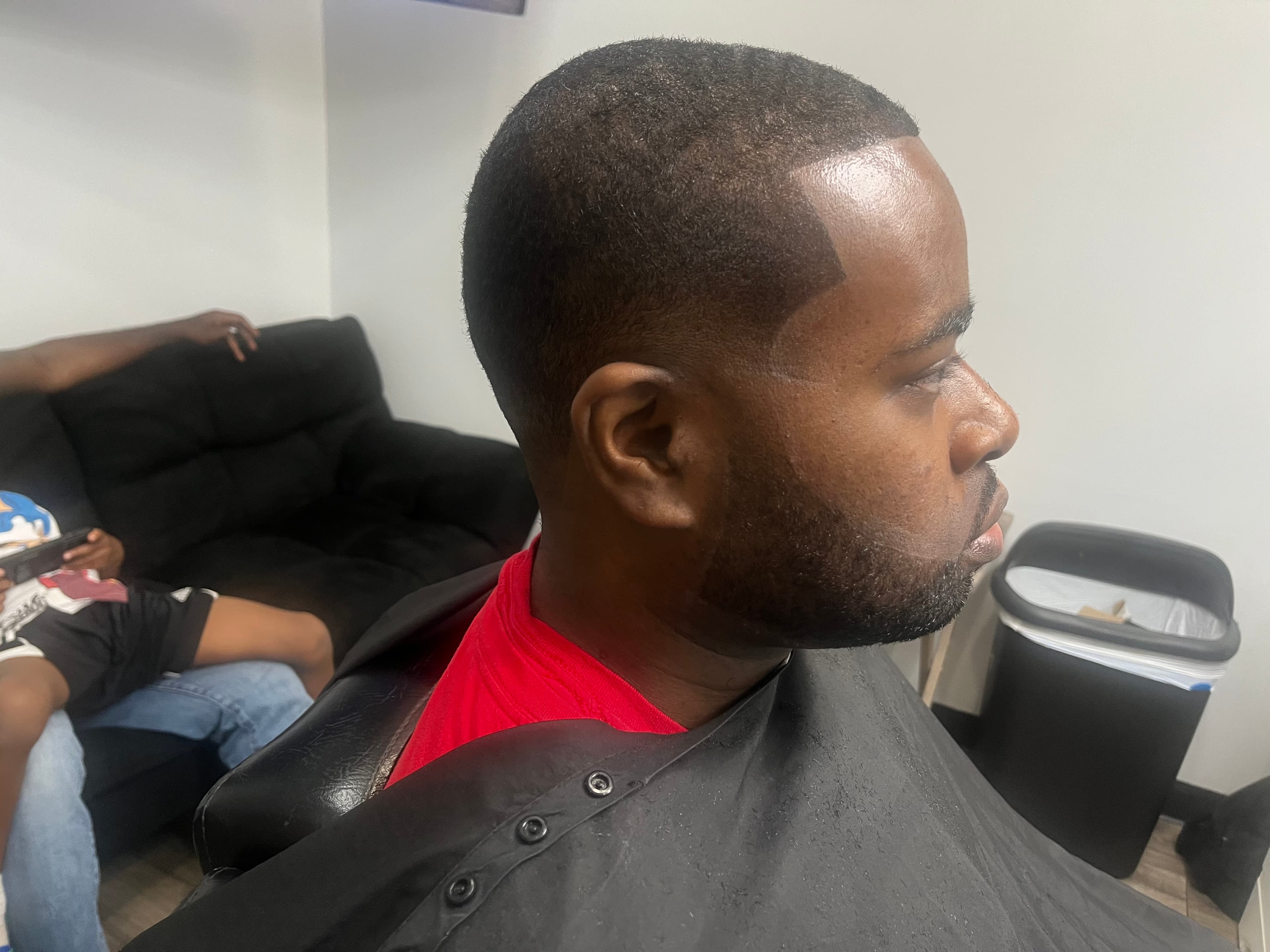 Clean taper fade haircut at Garland Cuts barber Suwanee GA